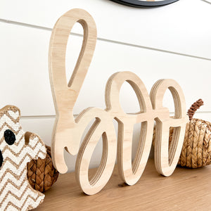 Hand-lettered "boo" wood sign in natural