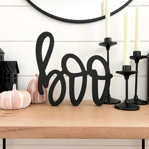 Hand-lettered "boo" wood sign in black
