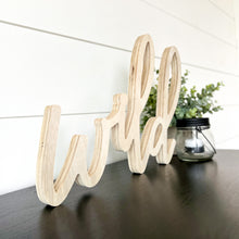 Load image into Gallery viewer, Hand-lettered "wild" wood sign sitting on table