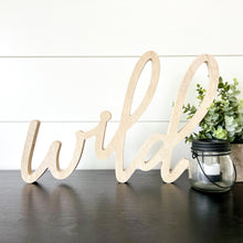 Load image into Gallery viewer, Hand-lettered &quot;wild&quot; wood sign sitting on table