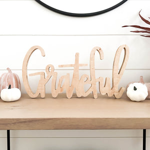 Hand-lettered "grateful" wood sign
