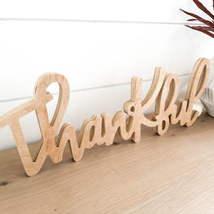 Hand-lettered "thankful" wood sign