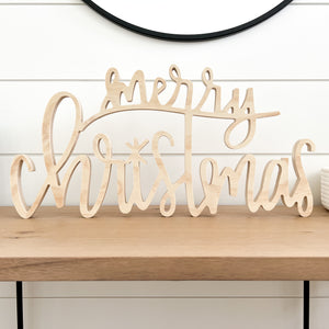Hand-lettered "merry christmas" wood sign
