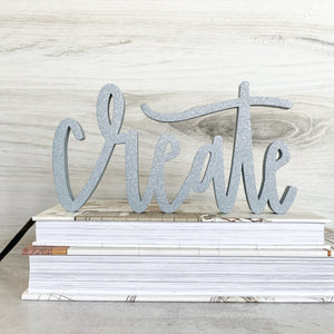 hand-lettered 'create' sign