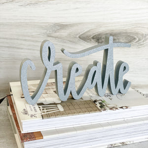 hand-lettered 'create' sign