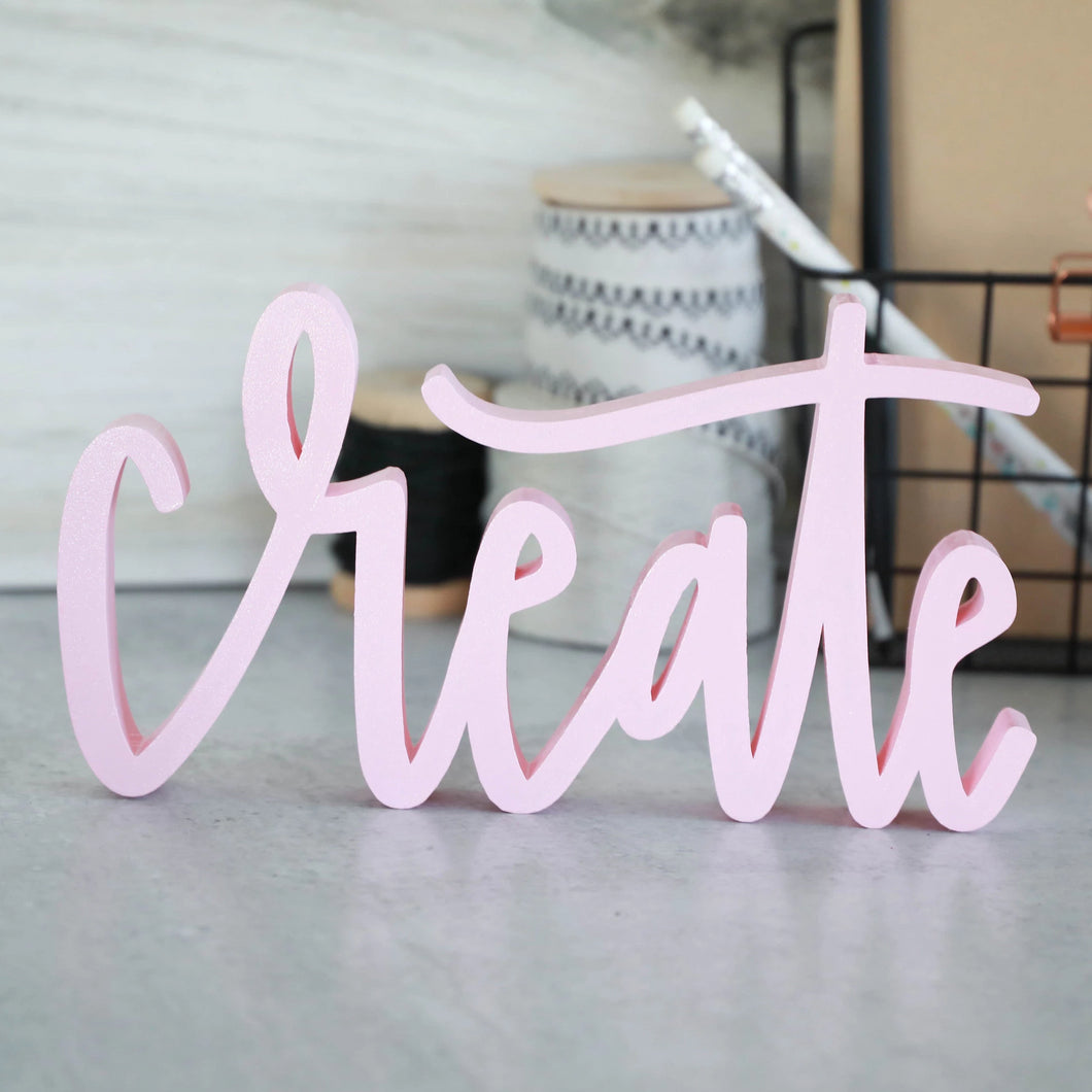 hand-lettered 'create' sign