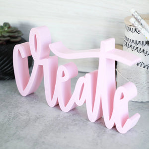 hand-lettered 'create' sign